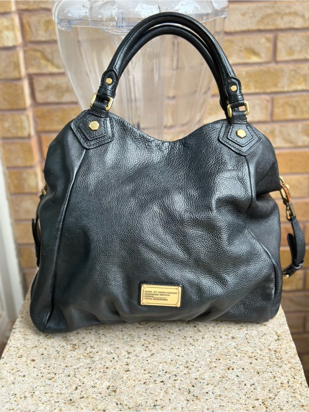 Mark Jacobs, Black Leather Satchel Handbag with Gold Hardware.
